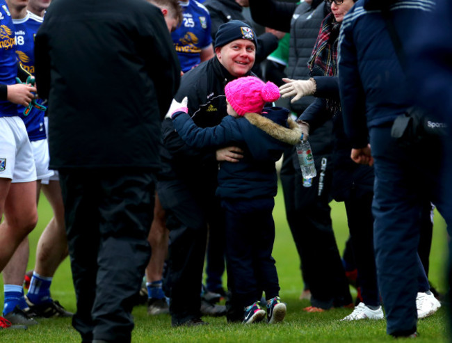 mickey-graham-celebrates-with-his-daughter-lauren-after-the-game