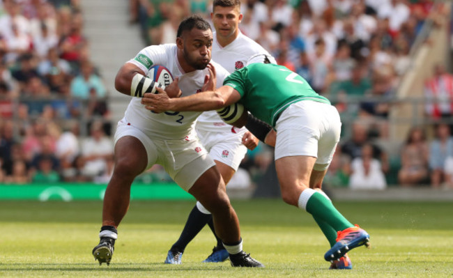 englands-billy-vunipola-is-tackled-by-irelands-rory-best