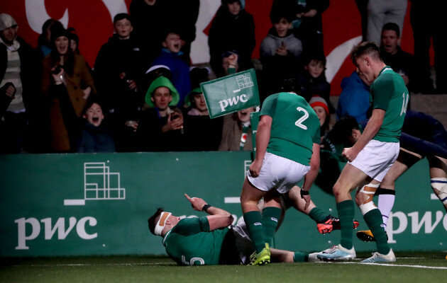 thomas-ahern-celebrates-scoring-a-try-with-tom-stewart-and-ethan-mcilroy