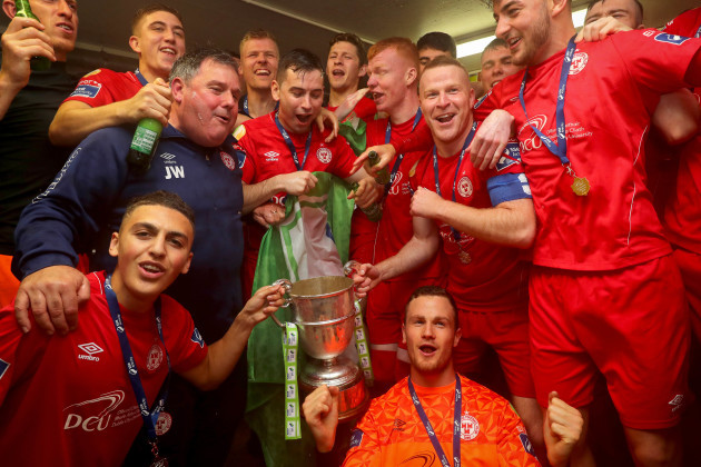 shels-celebrate-in-the-dressing-room-with-the-trophy-after-wining-the-league