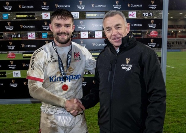 bill-johnston-is-presented-with-his-guinness-man-of-the-match-award-by-dave-callaghan