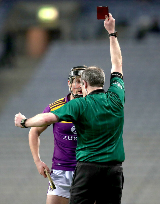 johnny-murphy-shows-conor-mcdonald-a-red-card