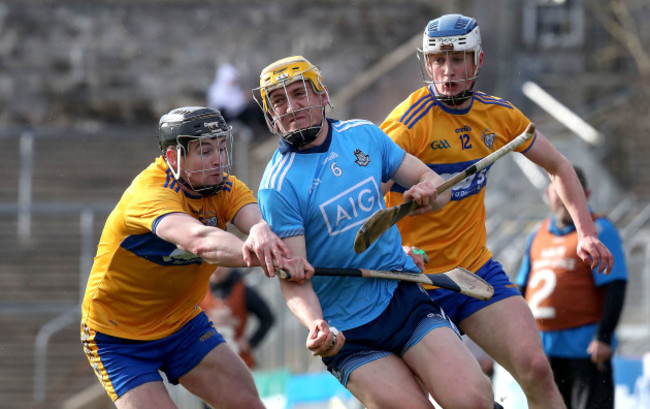 daire-gray-is-tackled-by-tony-kelly-and-diarmuid-ryan