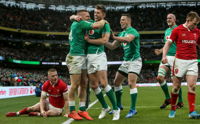 andrew-conway-celebrates-scoring-a-try-with-ross-byrne-and-john-cooney