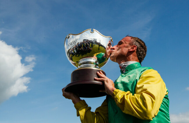 robbie-power-celebrates-winning-with-the-trophy