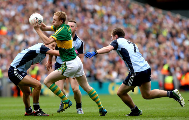 colm-cooper-chased-by-philip-mcmahon-jack-mccaffrey-and-jonny-cooper