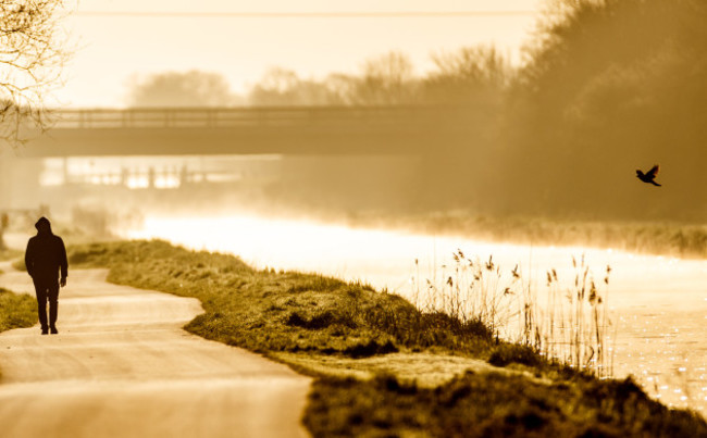 a-member-of-the-public-exercises-along-the-grand-canal-outside-tullamore-co-offaly