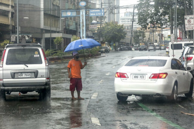 philippines-manila-typhoon-vongfong-rain