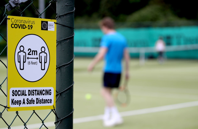 a-view-of-signs-reminding-members-to-be-socially-distant-at-greystones-tennis-club-today