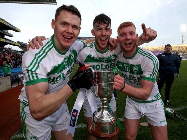 tj-reid-brian-cody-and-adian-mullen-celebrate-after-the-game-with-the-cup