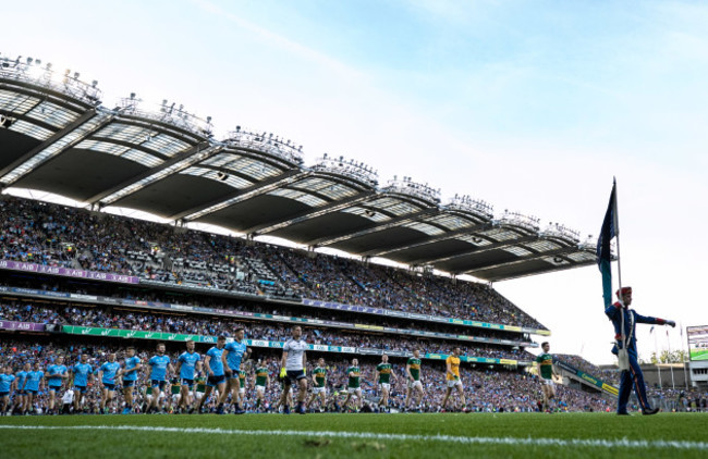 dublins-captain-goalkeeper-stephen-cluxton-and-kerry-captain-paul-murphy-lead-their-team-at-the-parade