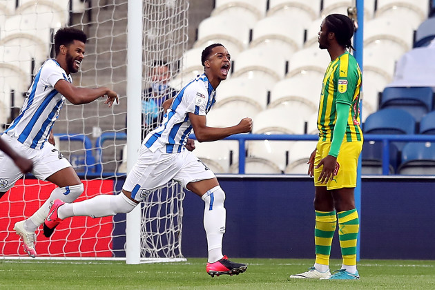 Willock celebrates the early goal for Huddersfield.
