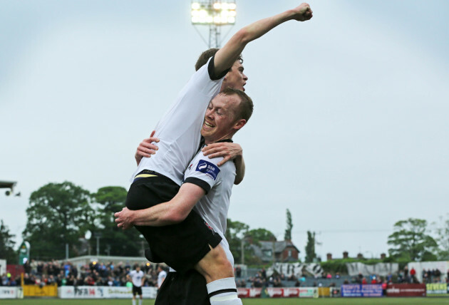 sean-gannon-is-congratulated-by-teammate-chris-shields