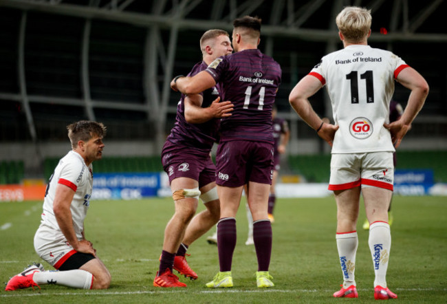 louis-ludik-and-rob-lyttle-dejected-as-scott-penny-celebrates-his-try-with-cian-kelleher