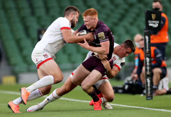 ciaran-frawley-is-tackled-stuart-mccloskey-and-james-hume