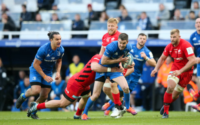 johnny-sexton-with-james-lowe-in-support-is-tackled-by-vincent-koch