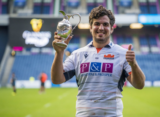 stuart-mcinally-celebrates-with-the-1872-cup-after-winning-the-derby-match