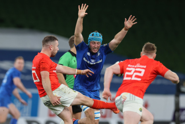 leinsters-will-connors-tries-to-charge-down-munsters-jj-hanrahan