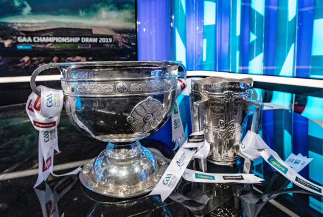 a-general-view-of-the-sam-maguire-and-liam-maccarthy-cups-ahead-of-the-draw