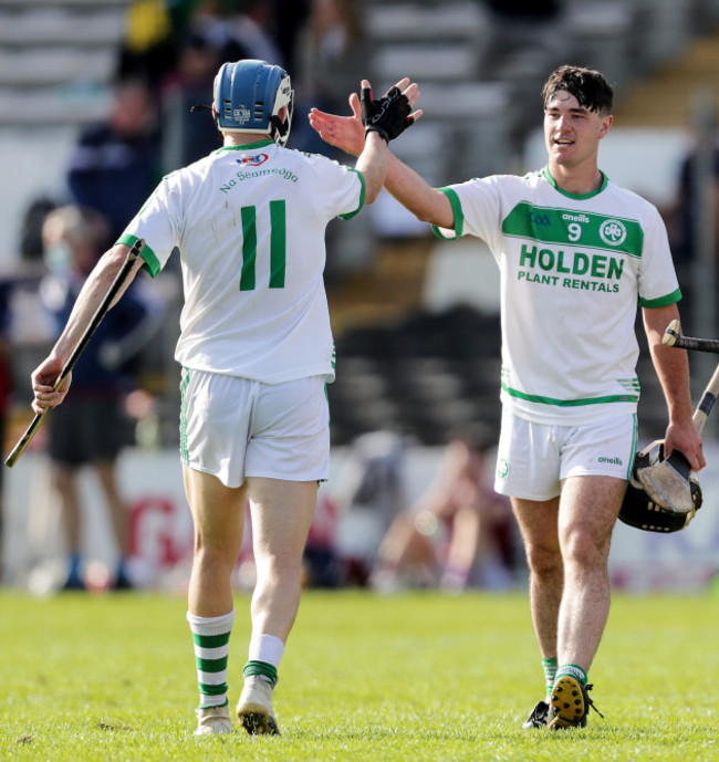 tj-reid-celebrates-at-the-final-whistle-with-ronan-corcoran