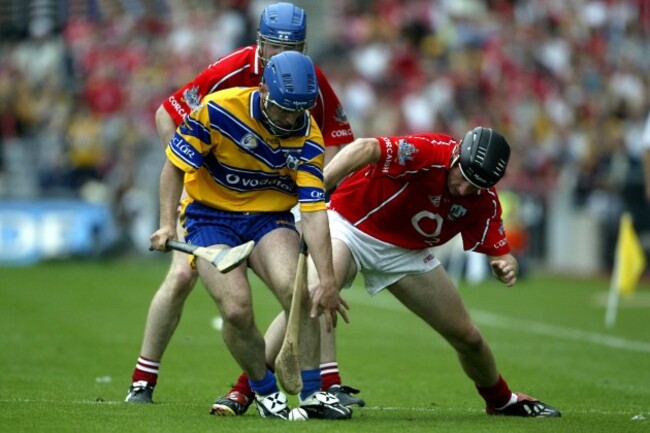 andrew-quinn-wins-the-ball-over-john-gardiner