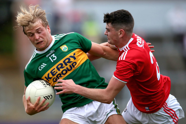 fiachra-clifford-is-tackled-by-maurice-shanley