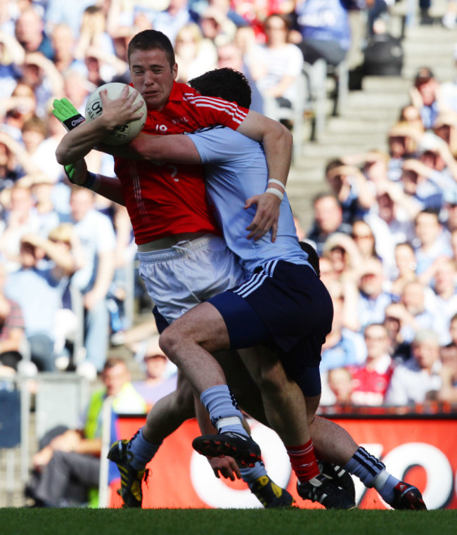 colm-oneill-is-tackled-by-ross-mcconnell