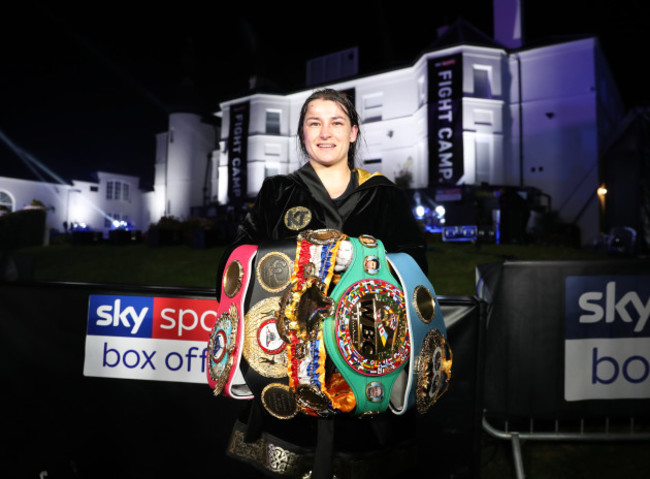 katie-taylor-with-her-titles-after-winning