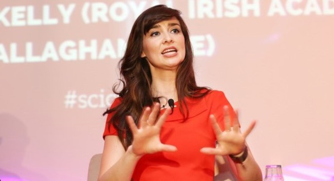 Aoibhinn Ní Shúilleabháin speaking at a conference