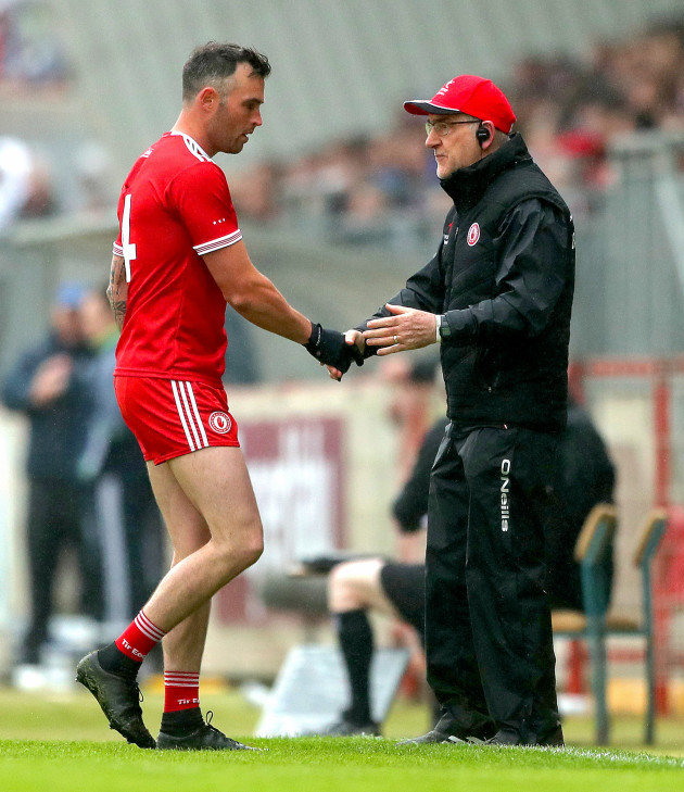 cathal-mccarron-with-manager-mickey-harte-as-he-is-replaced
