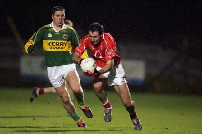 dermot-hurley-of-cork-is-tackled-by-darragh-ose-of-kerry-1122006