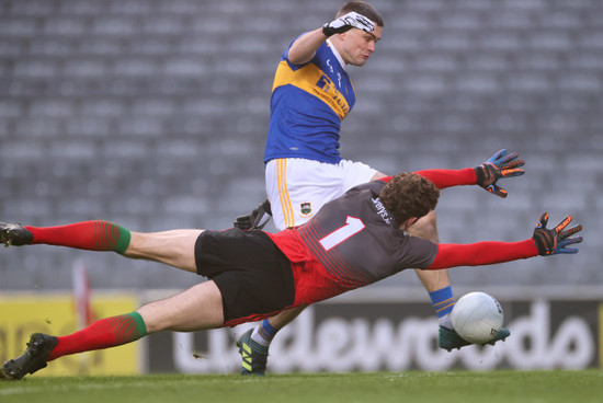 david-clarke-saves-a-goal-bound-effort-from-michael-quinlivan