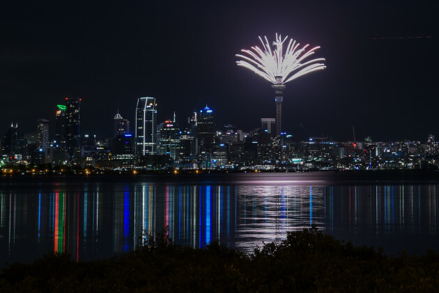 Crowds gather in New Zealand and China for New Year celebrations - but a muted tone is struck