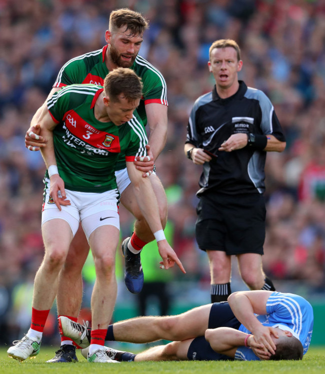 donal-vaughan-points-at-john-small-following-a-challenge-that-resulted-in-a-red-card