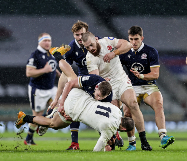 jonny-may-is-tackled-by-finn-russell