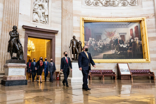 impeachment-managers-walking-to-the-impeachment-trial-in-the-senate-chamber