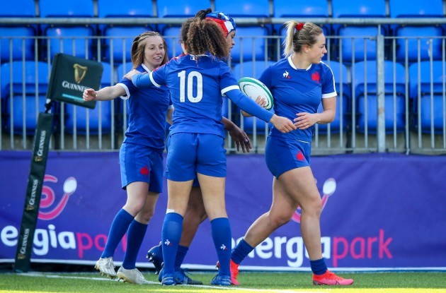 romane-menager-celebrates-after-scoring-a-try-with-safi-ndiaye-and-caroline-drouin