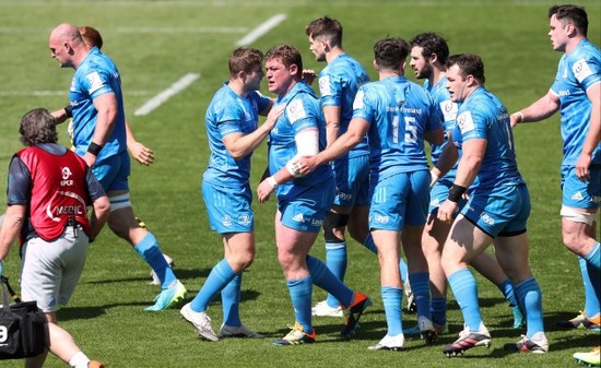 tadhg-furlong-celebrates-after-scoring-a-try-with-jordan-larmour-and-cian-healy