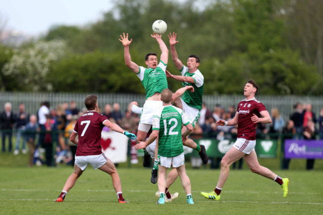 anthony-mcdermott-and-liam-feerick-compete-for-an-aerial-ball