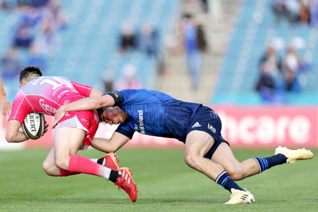 sam-davies-is-tackled-by-jimmy-obrien