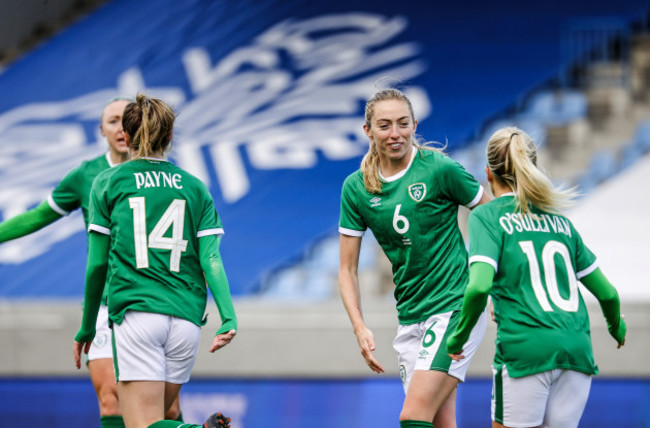 heather-payne-celebrates-with-megan-connolly-and-denise-osullivan-after-scoring-a-goal