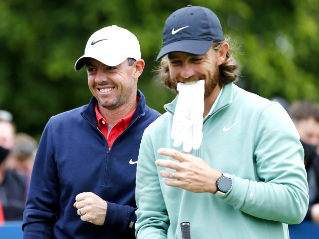 rory-mcilroy-and-tommy-fleetwood-share-a-joke-on-the-10th-tee