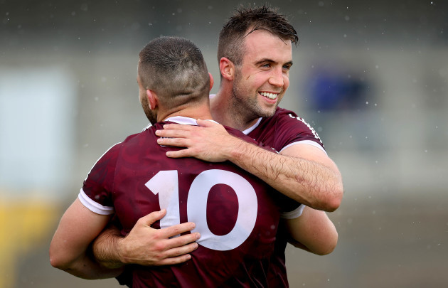 paul-conroy-and-damien-comer-celebrate