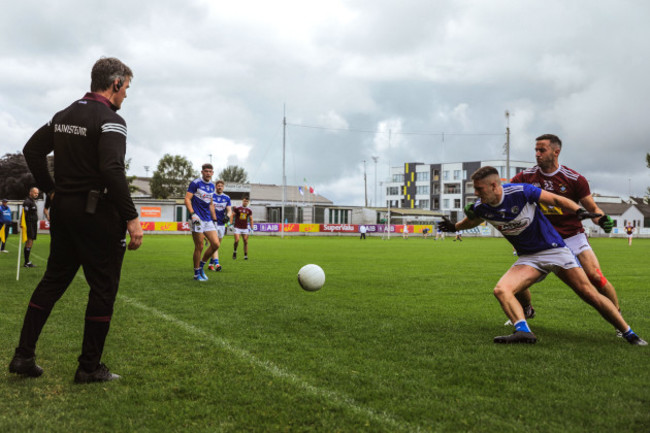 jack-cooney-watches-noel-mulligan-and-patrick-osullivan