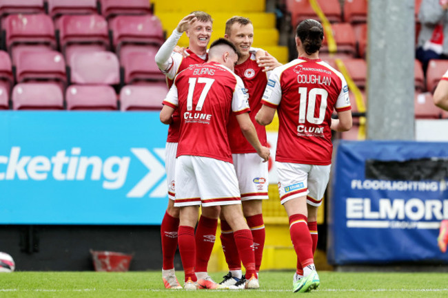 chris-forrester-celebrates-scoring-a-goal-with-teammates