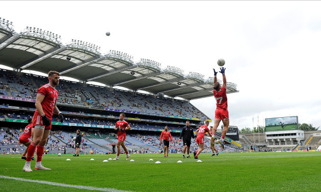 tyrone-players-warm-up-before-the-game