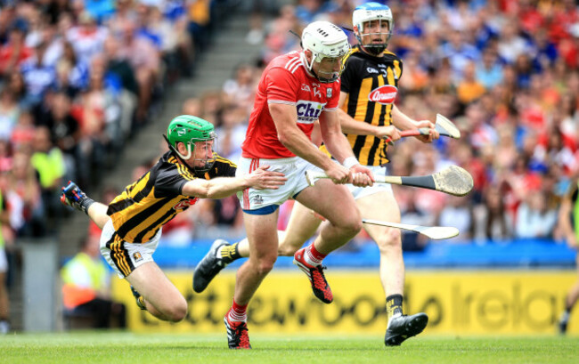 pat-horgan-scores-a-goal-despite-the-efforts-of-joey-holden