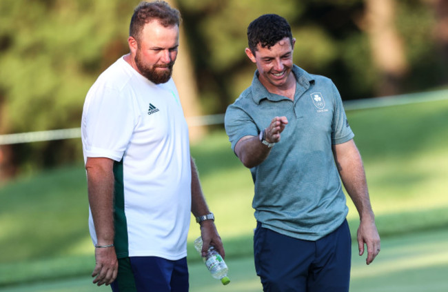rory-mcilroy-with-shane-lowry-moments-after-missing-a-putt-to-get-knocked-out-of-the-bronze-medal-play-off