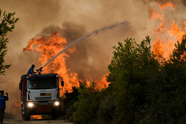 Forest fires rage near Athens Greece