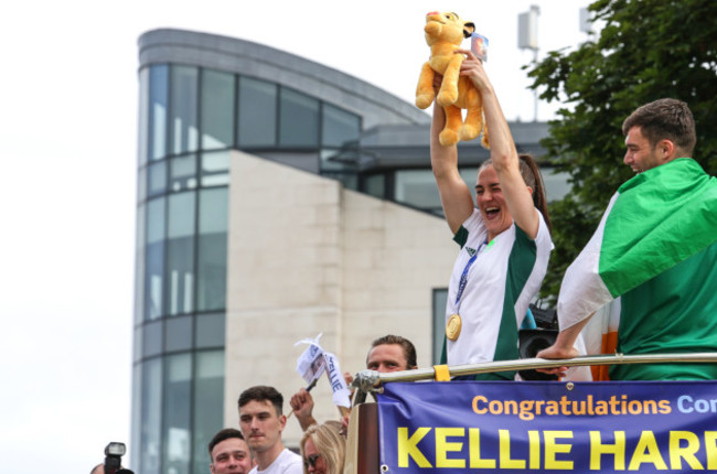 kellie-harrington-raises-a-plush-simba-to-the-crowd-in-reference-to-her-use-of-the-phrase-hakuna-matata